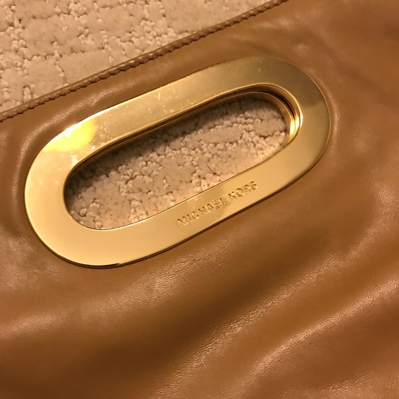 Michael Kors Handbags - Michael Kors tan clutch bag. Great condition!